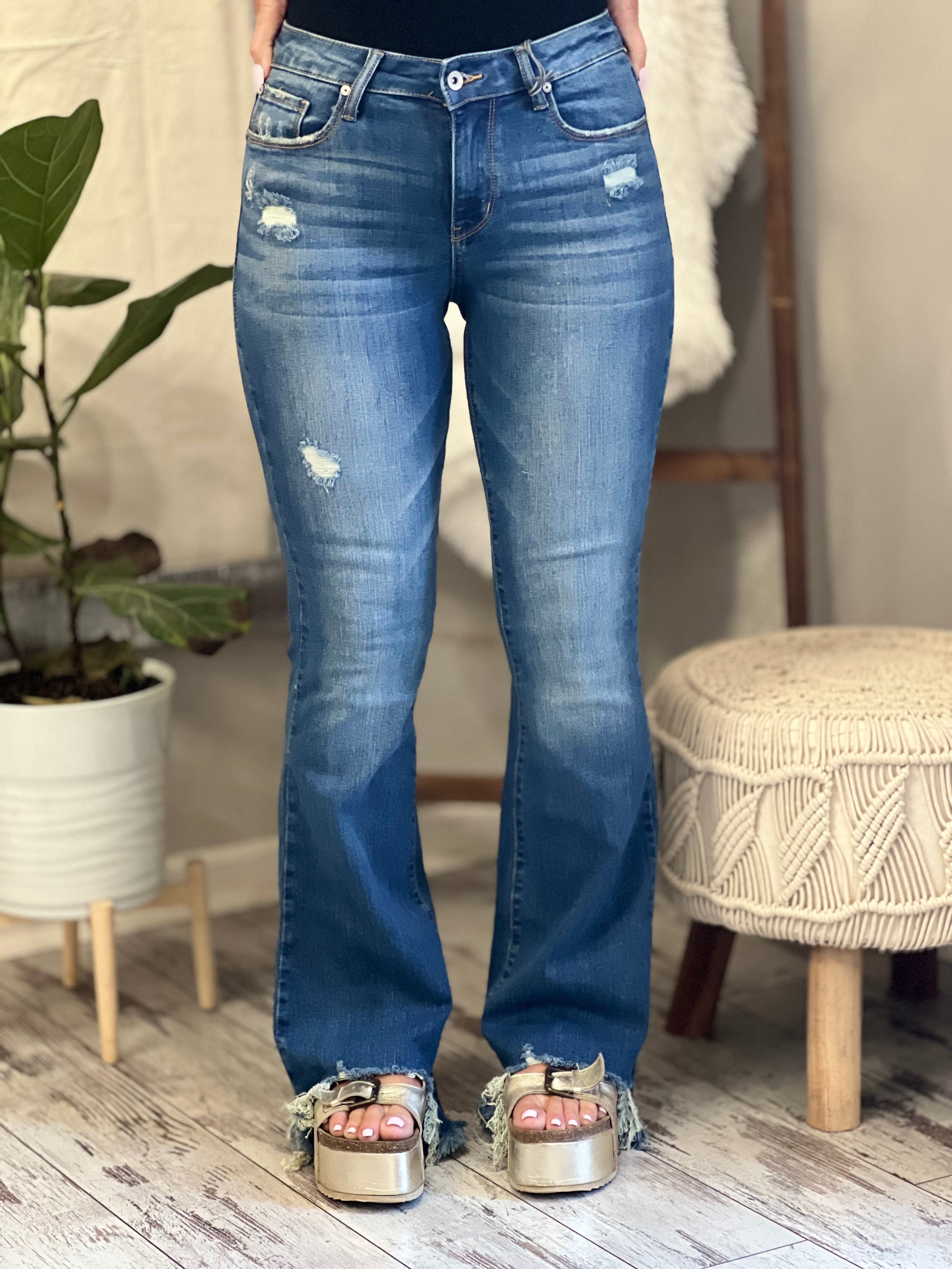 Mid Rise Asymmetric Hem Flare Jeans