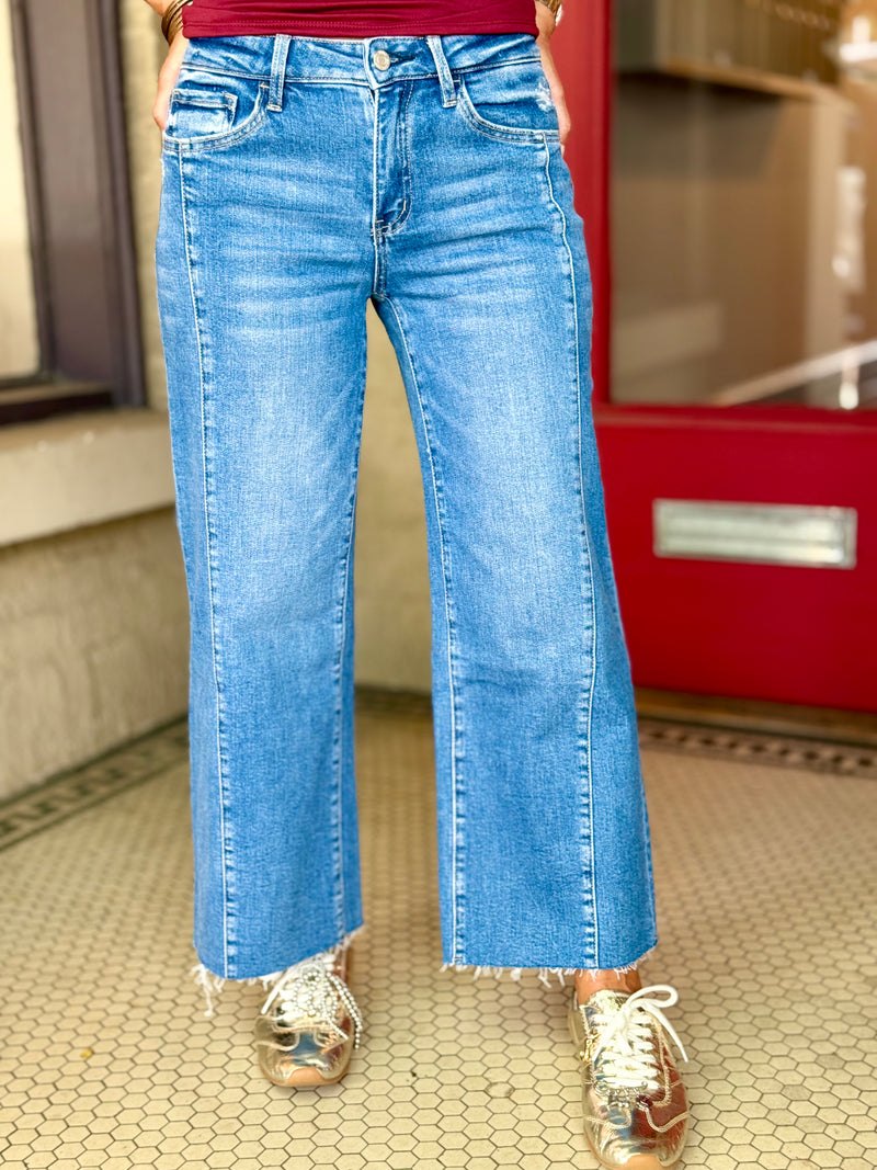 High Rise Raw Hem Twist Wide Leg Jeans