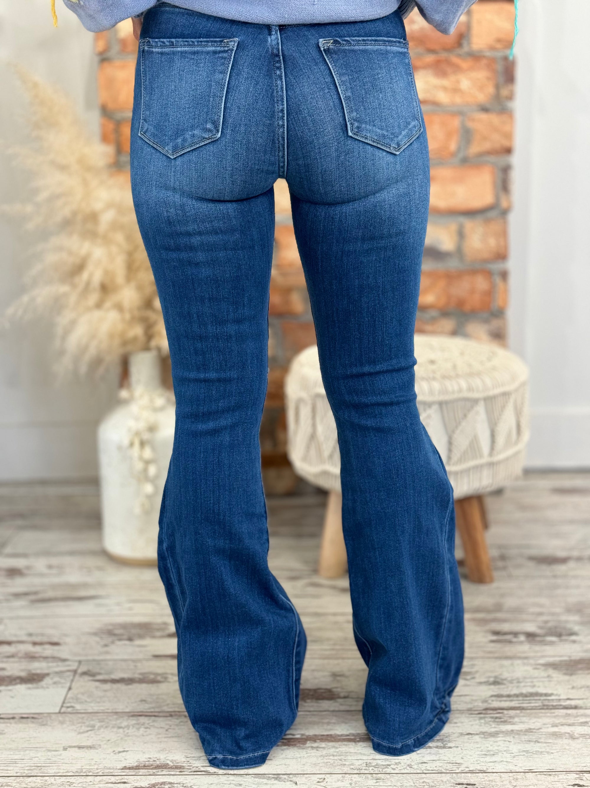 High Rise Angled Hem Flare Jeans