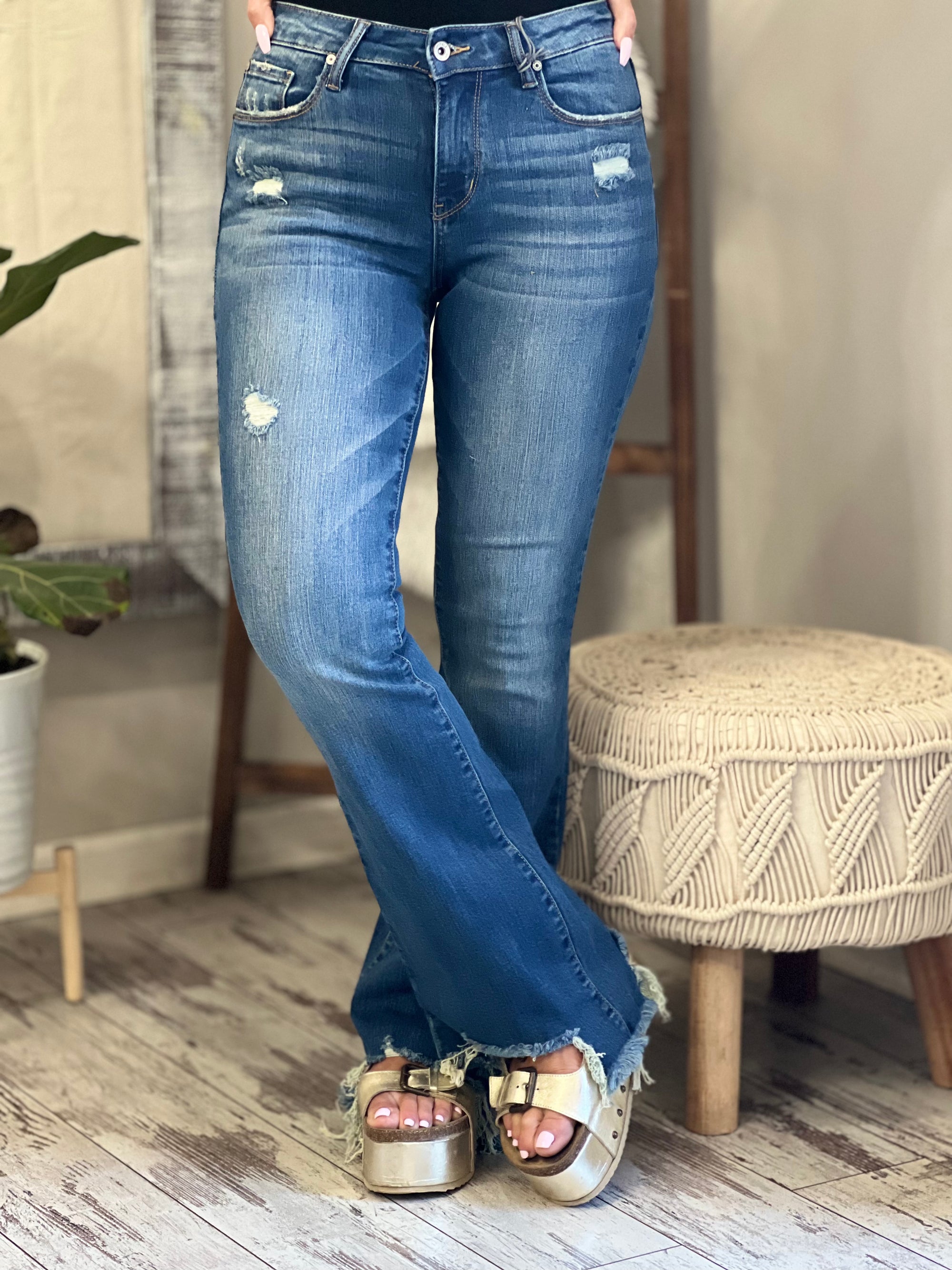 Mid Rise Asymmetric Hem Flare Jeans