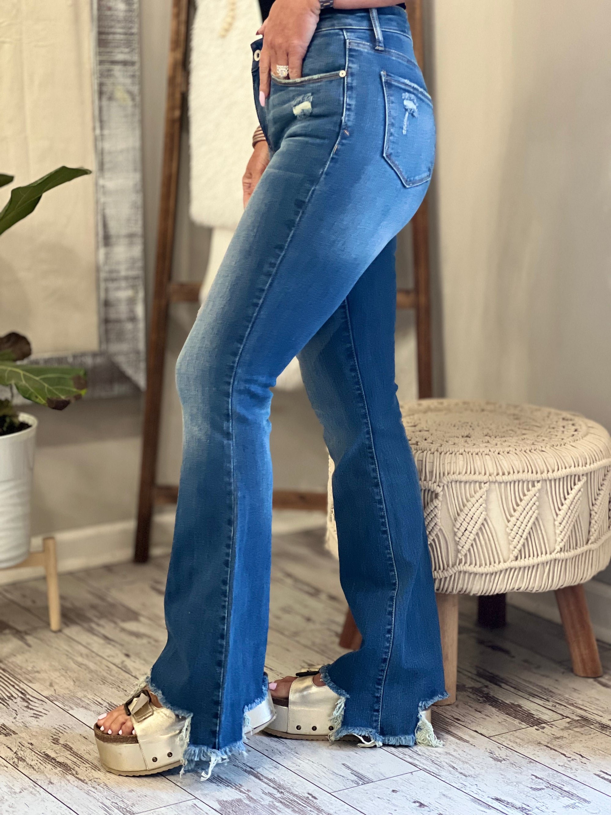 Mid Rise Asymmetric Hem Flare Jeans