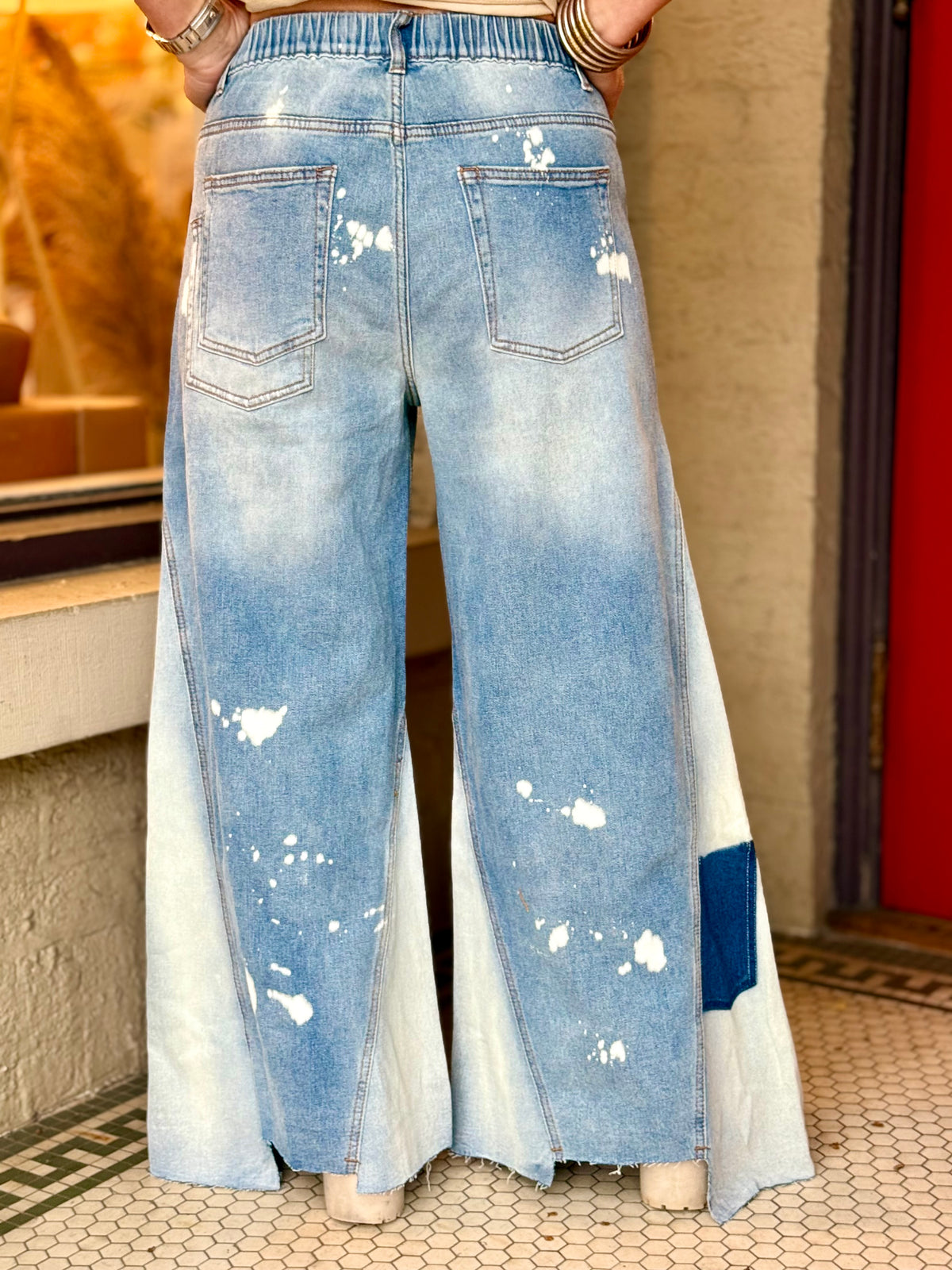 Paint Splattered Uneven Hem Wide Leg Jeans