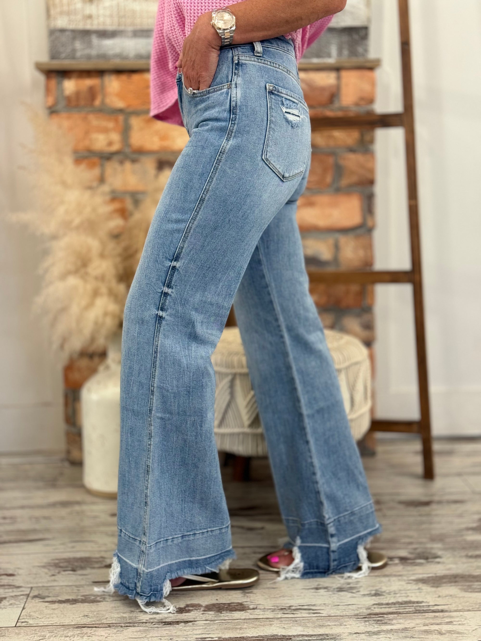 High Rise Destroyed Raw Hem Flare Jeans